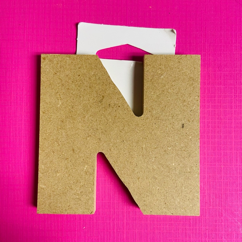 New. Block chunky wooden letter “N”. Natural tan wood color.